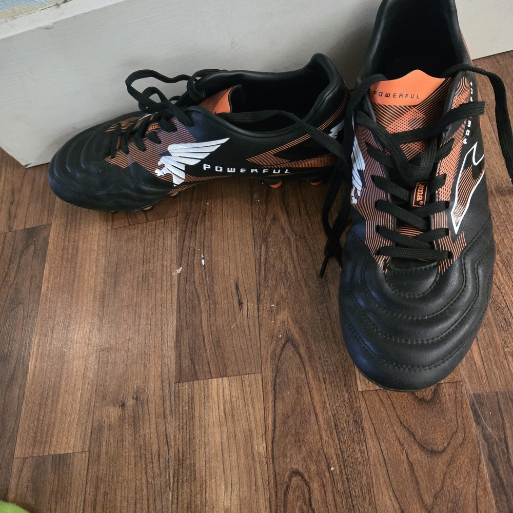 Black and Orange Soccer Cleats